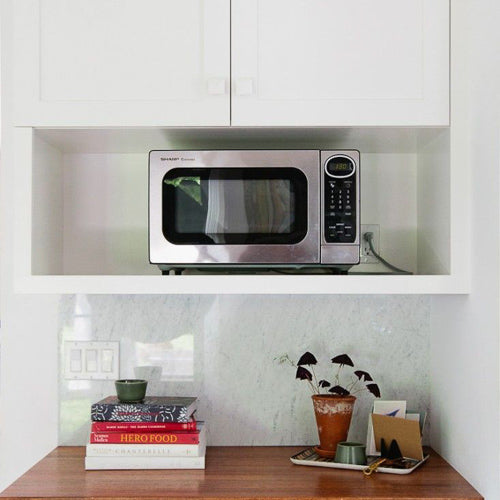 Stainless Steel in Toaster Oven Prevents Aluminum Garnish on Burrito